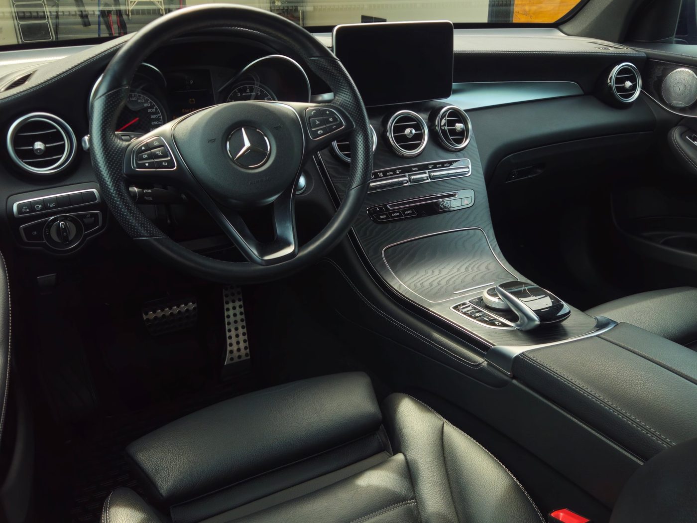 Clean black leather interior of a Mercedes-Benz GLC after detailing by Vantique Detailing